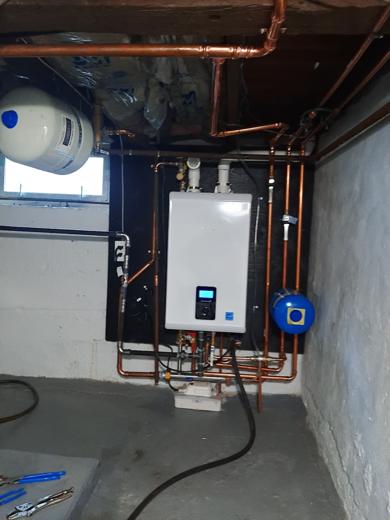 Boiler & water heater install by MJM