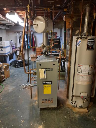 Boiler & water heater install by MJM
