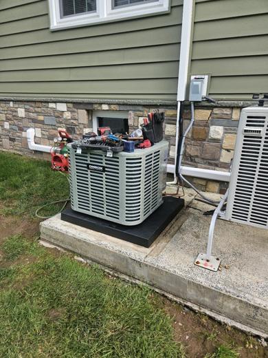 Central AC / heat pump condenser install by MJM