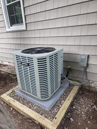 Central AC / heat pump condenser install by MJM